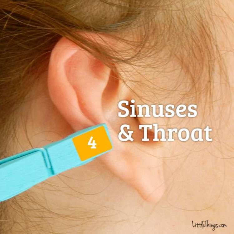 He puts a clothespin on his ear for a BRIGHT reason.  Have you tried it?
