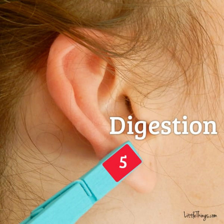 He puts a clothespin on his ear for a BRIGHT reason.  Have you tried it?